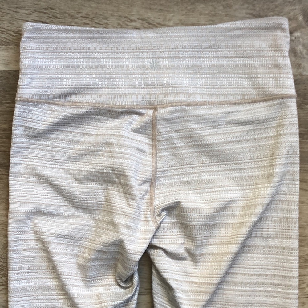 Athleta Leggings In a tan and white textured pattern. - Picture 12 of 13